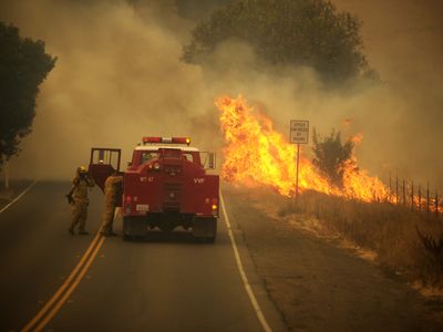 In Vacaville, California, the Hennessey Fire ignited on Tuesday afternoon and "nearly doubled in size in a matter of minutes," according to Getty.