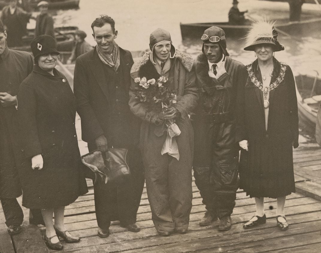 The crew of the Friendship arrives in England in 1928.