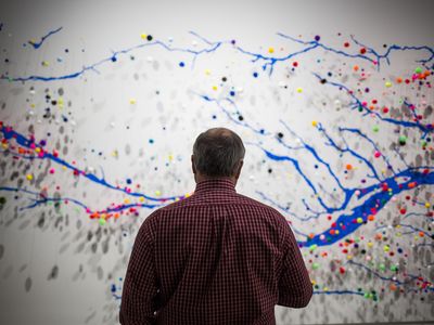 Artist Suzan Shutan assembled her map of the rivers and groundwater wells of Nebraska by projecting the data on the gallery's wall.
