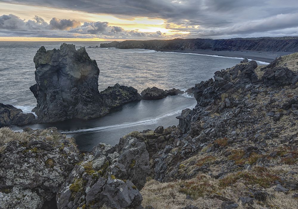 In Iceland, at one end of the 10,000-mile-long Mid-Atlantic Ridge, a visitor could see new crust being born as magma oozes up from the interior.