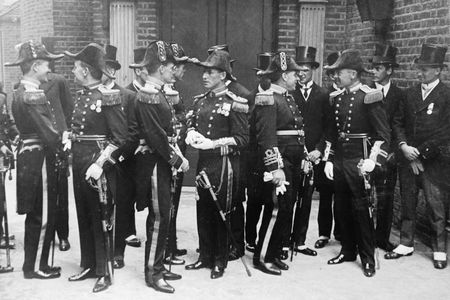 The King receives members of Scott's expedition at Buckingham Palace in England here. Shown are Lt. Bennie, Paymaster Drake, Paymaster Drake, Commander Campbell, Commander Evans, Commander Bruce, and Sir Levick, 1913.