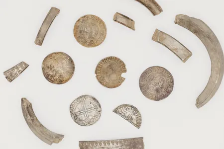 The trove included around silver coins, jewelry, and other artifacts. 