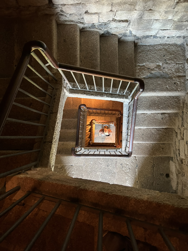 Playful geometry and lighting in the ancient staircase thumbnail