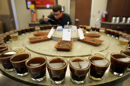 A coffee roaster does a taste test in Los Angeles.