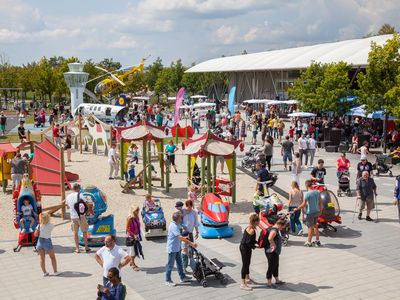 Munich Airport’s two-day summertime Music and Family Days celebration lures up to 25,000 visitors per day with theme-park style rides and musical performances, along with the chance to ogle modern and vintage airplanes.
