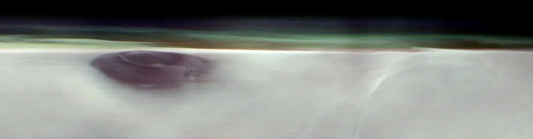 landscape image of Arsia Mons rising above the clouds