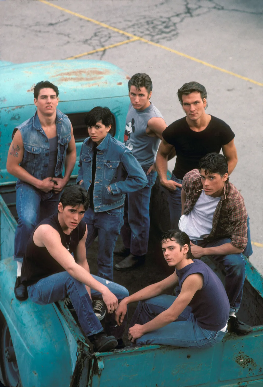 Clockwise from back left: Tom Cruise, Ralph Macchio, Emilio Estevez, Patrick Swayze, Rob Lowe, C. Thomas Howell and Matt Dillon