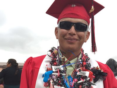 Graduate Fernando Yazzie after the ceremony at Navajo Technical University.