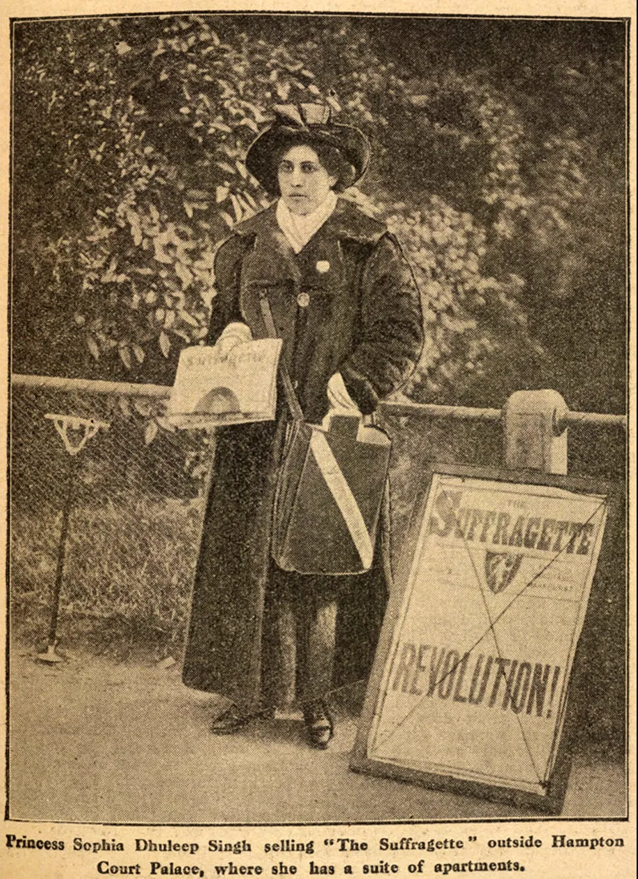 A photo of Sophia selling copies of the Suffragette newspaper outside of Hampton Court Palace
