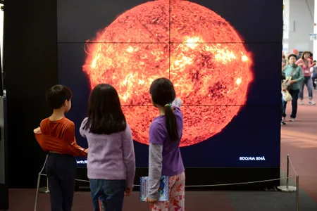 The 7-by-6-foot video wall on view at the National Air and Space Museum closes the 93 million mile gap between the Earth and the Sun.