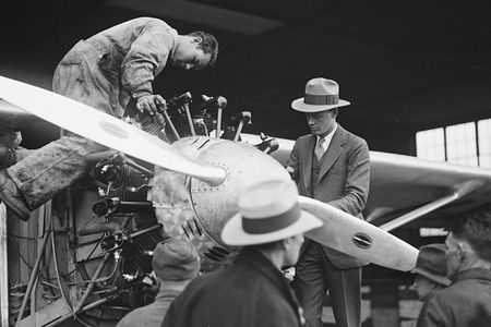 Charles Lindbergh (in fedora) and a mechanic check out the Spirit of St. Louis’ engine circa 1927.