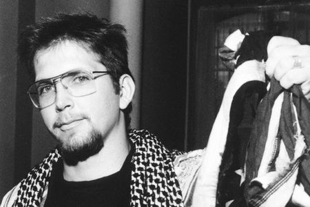 Gregory "Joey" Johnson, holds a flag sent to him by an unknown well-wisher in New York, Wednesday, June 28, 1989.