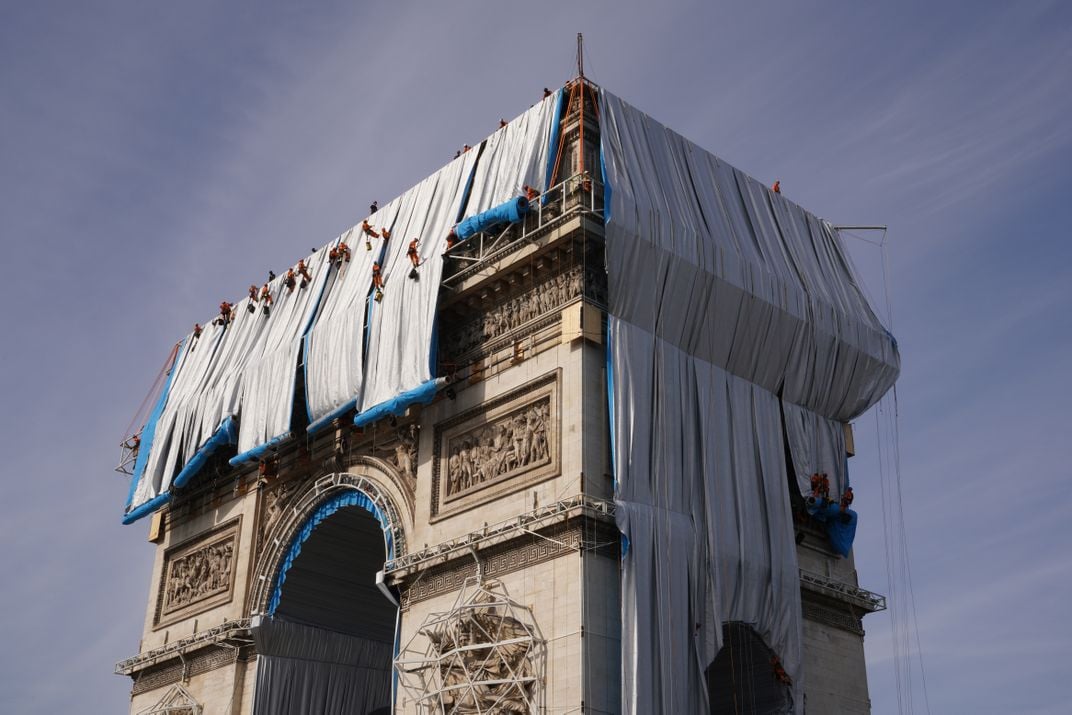 The Arc de Triomphe Is Wrapped in Fabric, Just as the Late Artists Christo and Jeanne-Claude Planned It