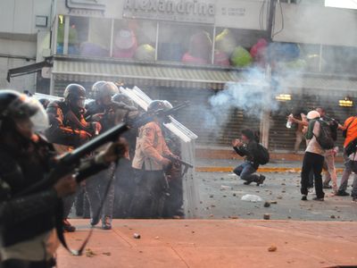 Tear gas being used on protesters in Caracas in February. 