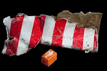 Flight 93 fuselage and call button, now housed in the collections of the Smithsonian's National Museum of American History