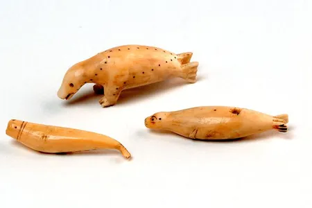 These walrus ivory carvings were collected in the mid-1880s. They were featured in a catalogue for the exhibition "Looking Both Ways: Heritage and Identity of the Alutiiq People" at the Smithsonian’s National Museum of Natural History in 2003. 