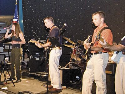 Max Q performs at the STS–114 mission success celebration at Space Center Houston in 2005.