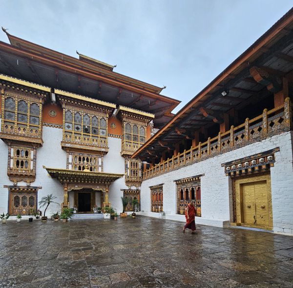 Bhutanese Monk in front of a sacred temple in Punakha Dzong thumbnail