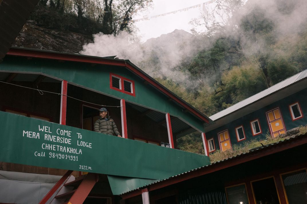 Porter Pasang Sherpa observes his high-altitude surroundings