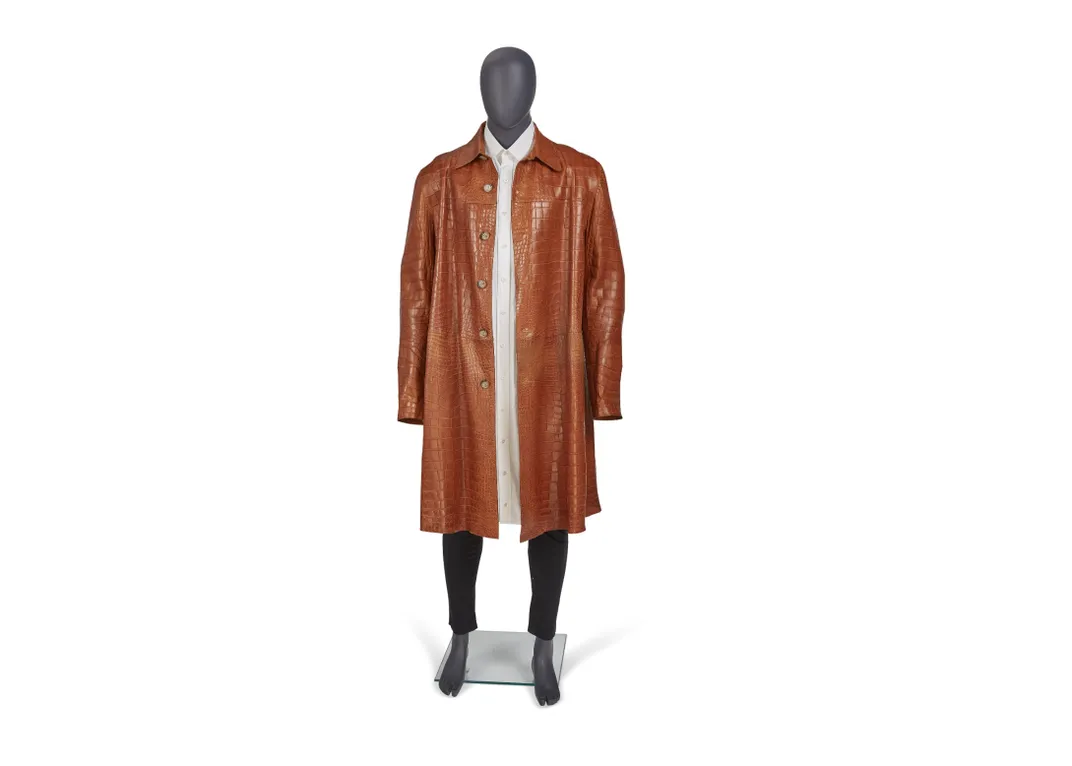 An umber alligator coat by Prada.