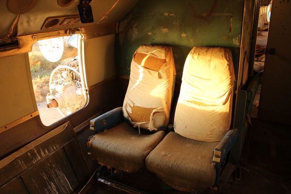 Worn Seats on an Abandoned Plane thumbnail