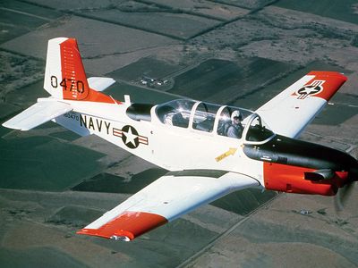 The author aspired to fly Douglas A-4s like the 1979 Blue Angels, who made him yearn to become a Naval aviator. The front seat of a Beechcraft T-34C trainer like this one was as close as he got.