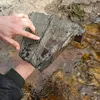 A Fisherman and His Son Noticed Strange Pieces of Wood on a Beach. They Turned Out to Be Fragments of a Polynesian Canoe icon