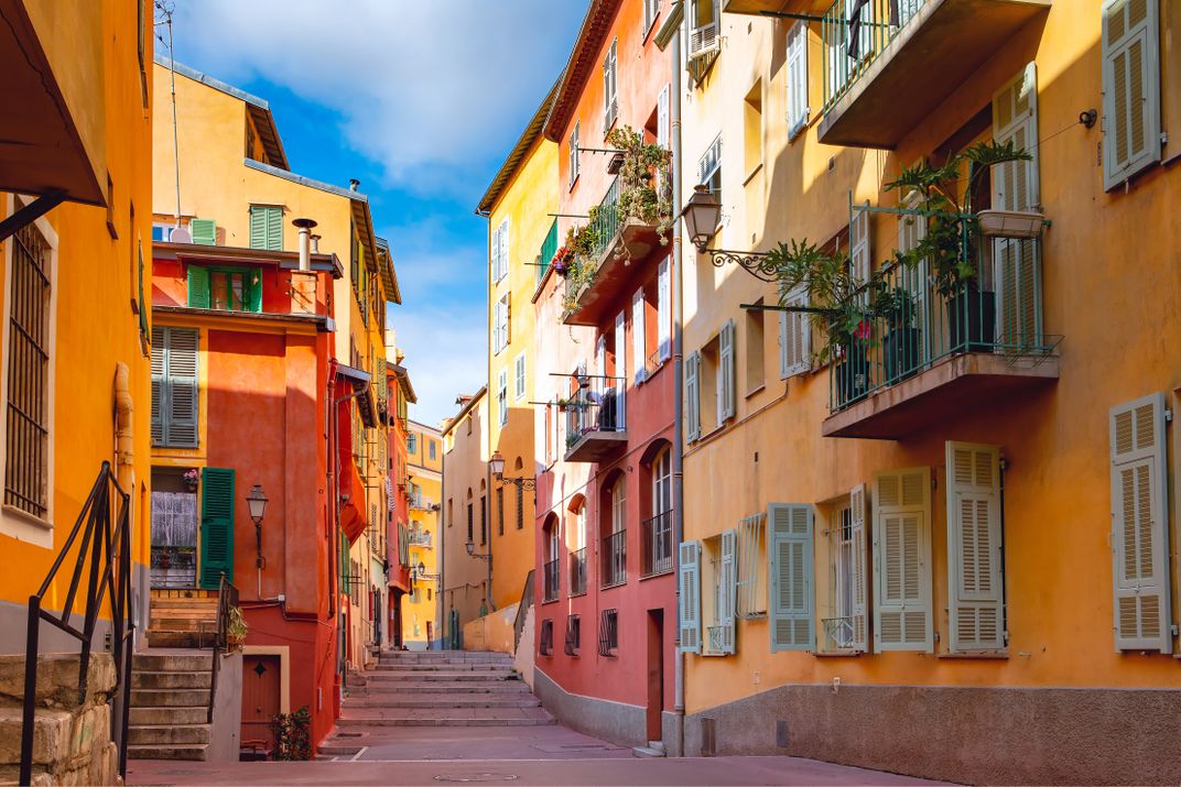 A colorful street in the Old Town of Nice, France