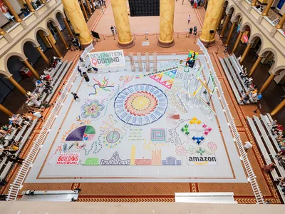 Artist Lily Hevesh&#39;s 50-by-50-foot domino display at the&nbsp;National Building Museum in Washington, D.C.