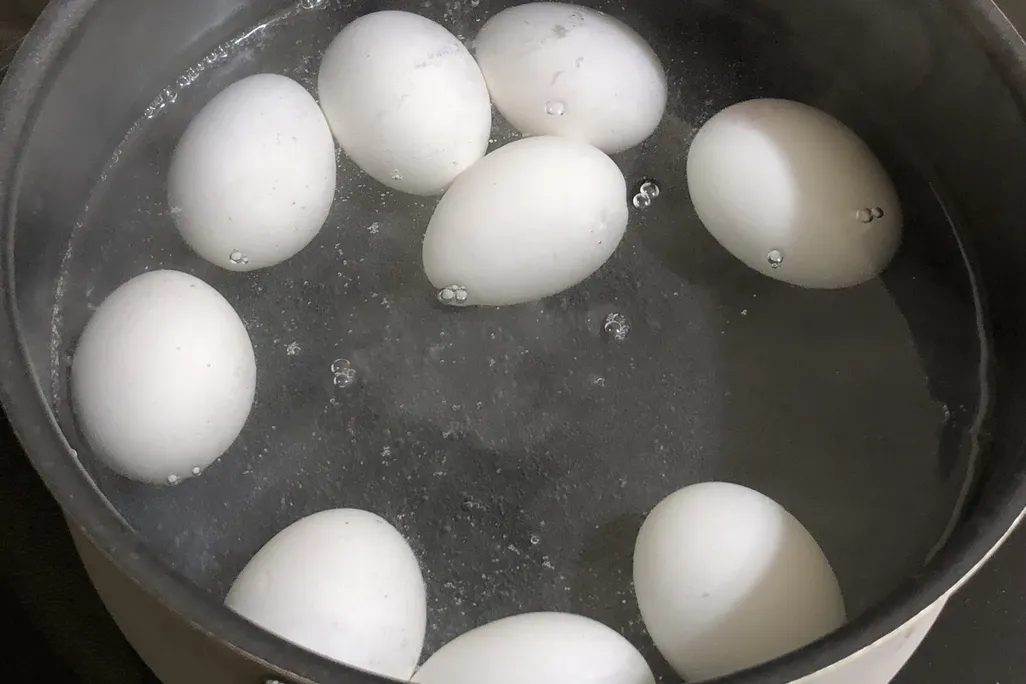 hard boiled eggs in hot water.