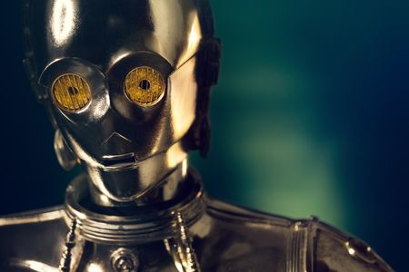 Gold plating sheathes most of C-3PO’s costume. Later films included variations such as a red arm.