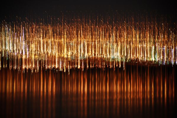 Taken form the 16th floor of a balcony in Burlington Ontario. The lights are from a reflection in Lake Ontario. thumbnail