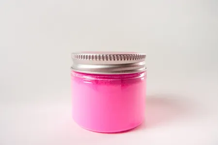A jar of the world's pinkest pink paint pigment.