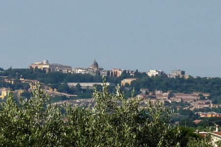 The Papal Palace of Castel Gandolfo sits atop a hillside overlooking Lake Alban.