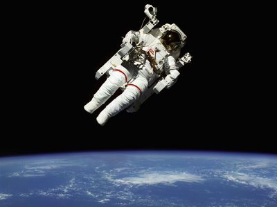 Space shuttle astronaut Bruce McCandless floats in space
