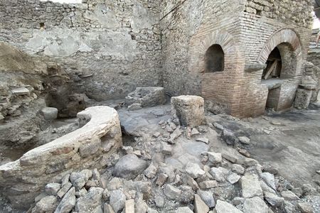 At this ancient bakery, enslaved individuals and donkeys worked under bleak conditions to grind grain.