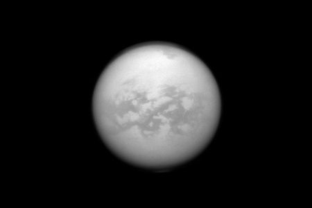 This infrared image taken by the Cassini spacecraft shows the surface underneath Titan's hazy atmosphere. According to NASA, "The dark features are believed to be vast dunes of hydrocarbon particles that precipitated out of Titan's atmosphere."

Image: NASA/JPL-Caltech/Space Science Institute