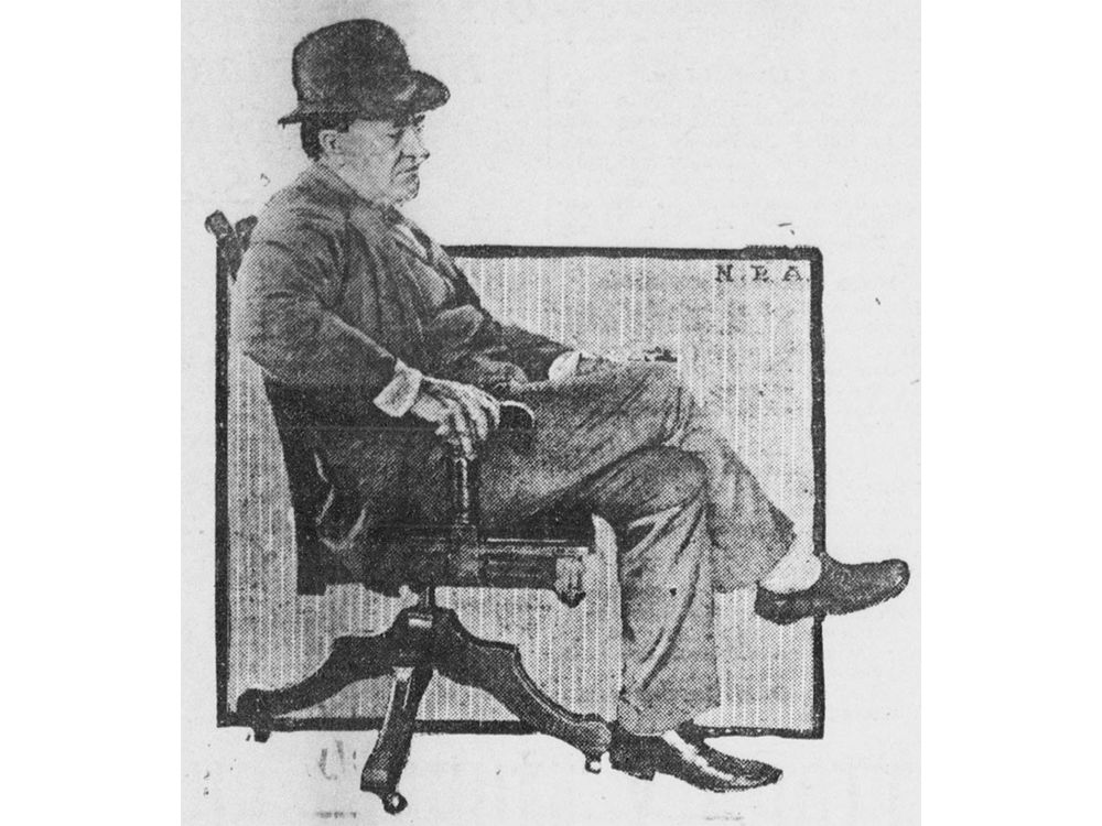 An old photograph of Thomas Edison asleep in an office chair. It looks like a line drawing and depicts Edison with a suit and top hot on dozed off in his chair.