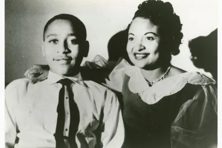 Black and white photographic print of Emmet Till and his mother, Mamie Till Mobley.