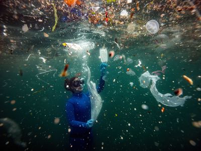 Turkish world-record-holding free-diver Sahika Ercumen swims amid plastic waste on June 27, 2020, to raise awareness about plastic pollution.
