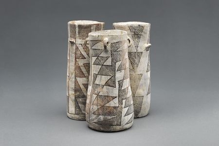The Chaco Canyon chocolate-drinking jars have a distinct shape, with connections to similarly shaped Mayan vessels. After testing distinguishable jar fragments from an excavated trash pile in in the canyon, archaeologists determined all of the drinking jars were used to consume cacao. (A336494, A336499, A336493, James Di Loreto, Smithsonian)