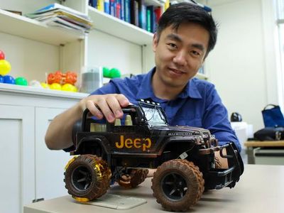 Wang with the toy jeep