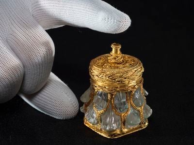 Discovered with the Galloway Hoard in Scotland, a gold-wrapped rock crystal jar includes the name of a previously unknown bishop from medieval Britain.