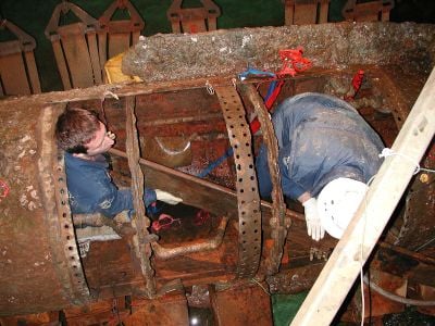 Conservators working on the H.L. Hunley