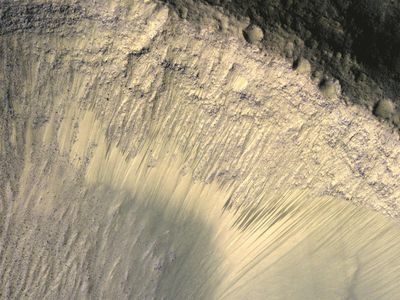 The dark streaks known as recurring slope lineae are thought to be evidence of briny water on the Martian surface.