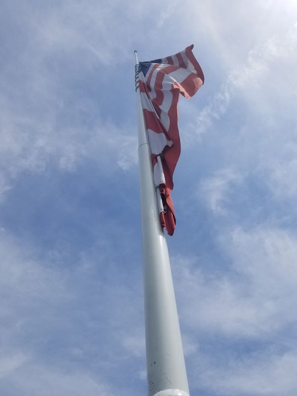 Huge flag at half staff on memorial day 2018 a top the world steepest incline plane thumbnail