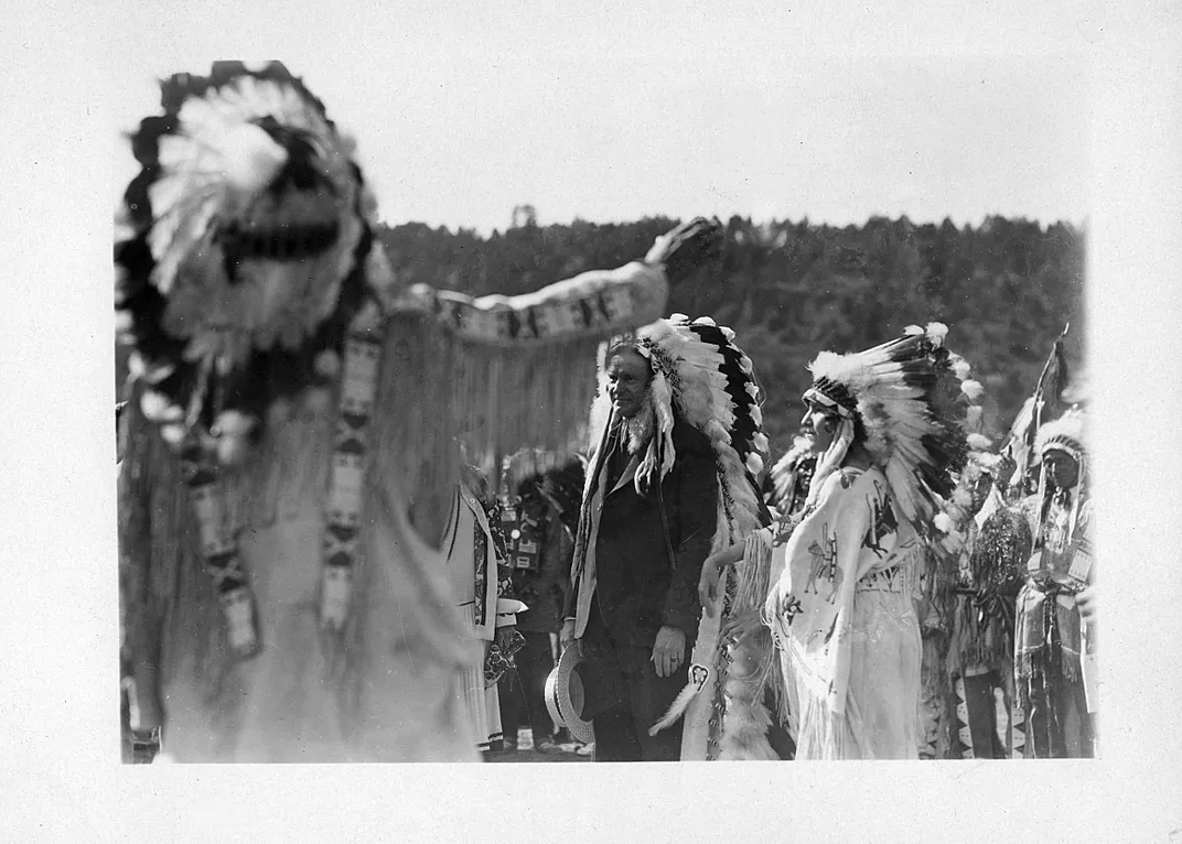 Coolidge receiving headdress from Sioux Nation