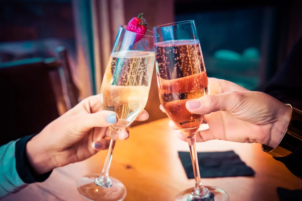 Champagne glasses cheersing