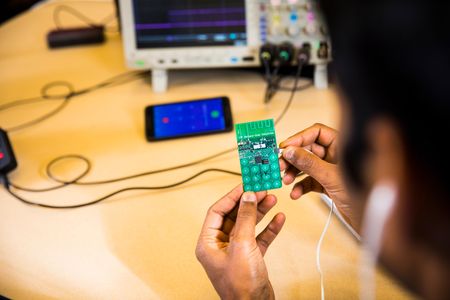 The no-frills battery-free phone prototype is powered by ambient radio signals or light.