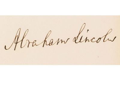 A close-up of Abraham Lincoln's signature on the Emancipation Proclamation.